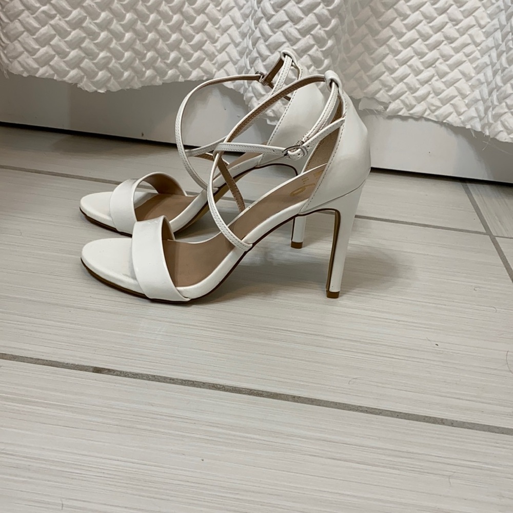 Brand new white heels.